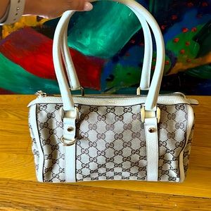 Authentic cream and brown Gucci Monogram Boston Bag.